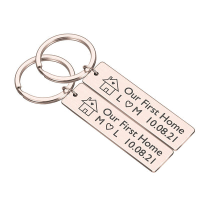 2 x Personalised housewarming keyrings set with initials and date